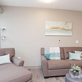 a living room with a couch and a coffee table