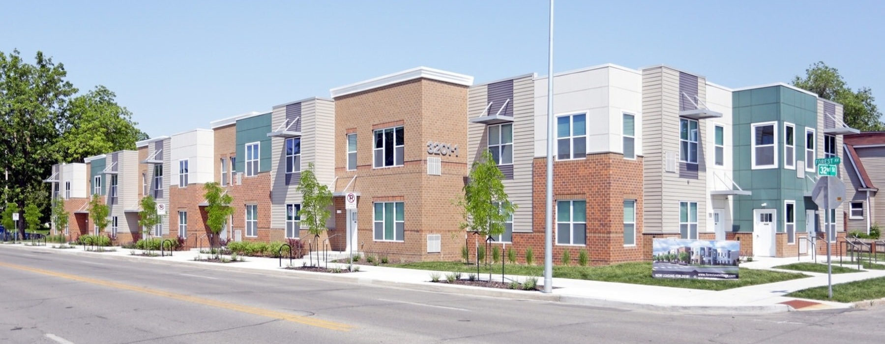 a street with a row of buildings