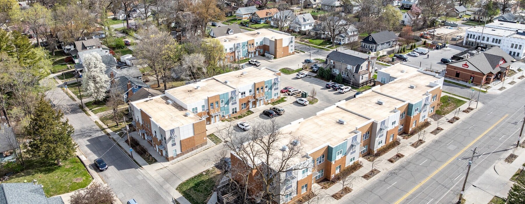 a high angle view of a town and an apartment